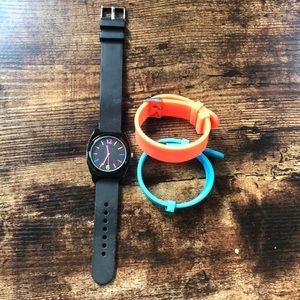 Black watch with neon numbers, bright orange and blue changeable bands